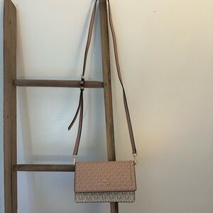 Pink and cream Michael Kors crossbody bag